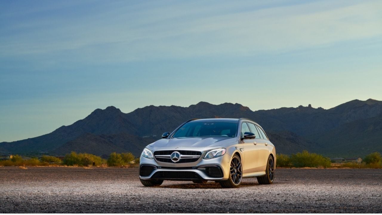 Portland, OR, USA- 2018 Mercedes-AMG E63 S 4MATIC Wagon parked showing the front of the car with mountains in the background