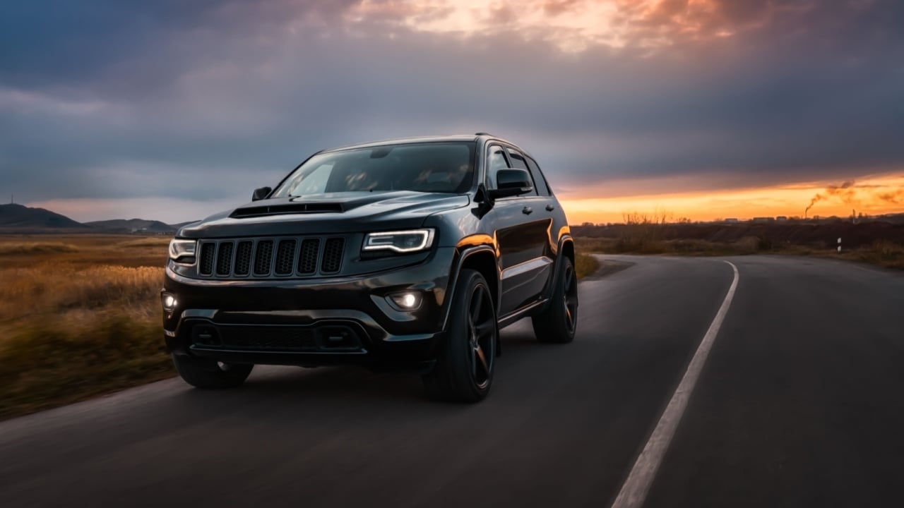 Los Angeles, California; September 20, 2022 Jeep grand cherokee wk2 Trackhawk drives on the road at sunset in autumn