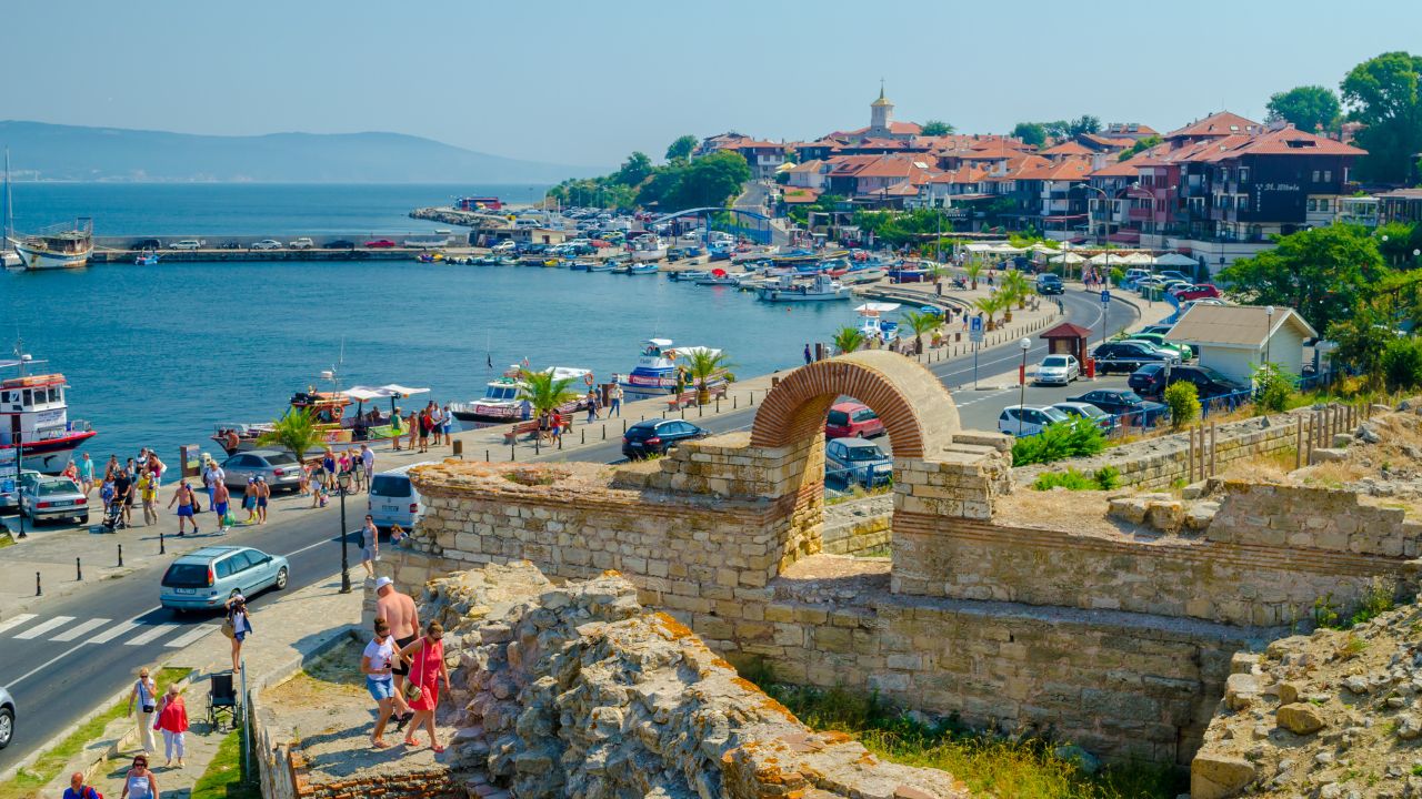 Tourists visiting the churches and the ruins of Old Town Nessebar, Bulgaria, Black sea. UNESCO World Heritage Site. Sep 25, 2015 Nessebar Bulgaria