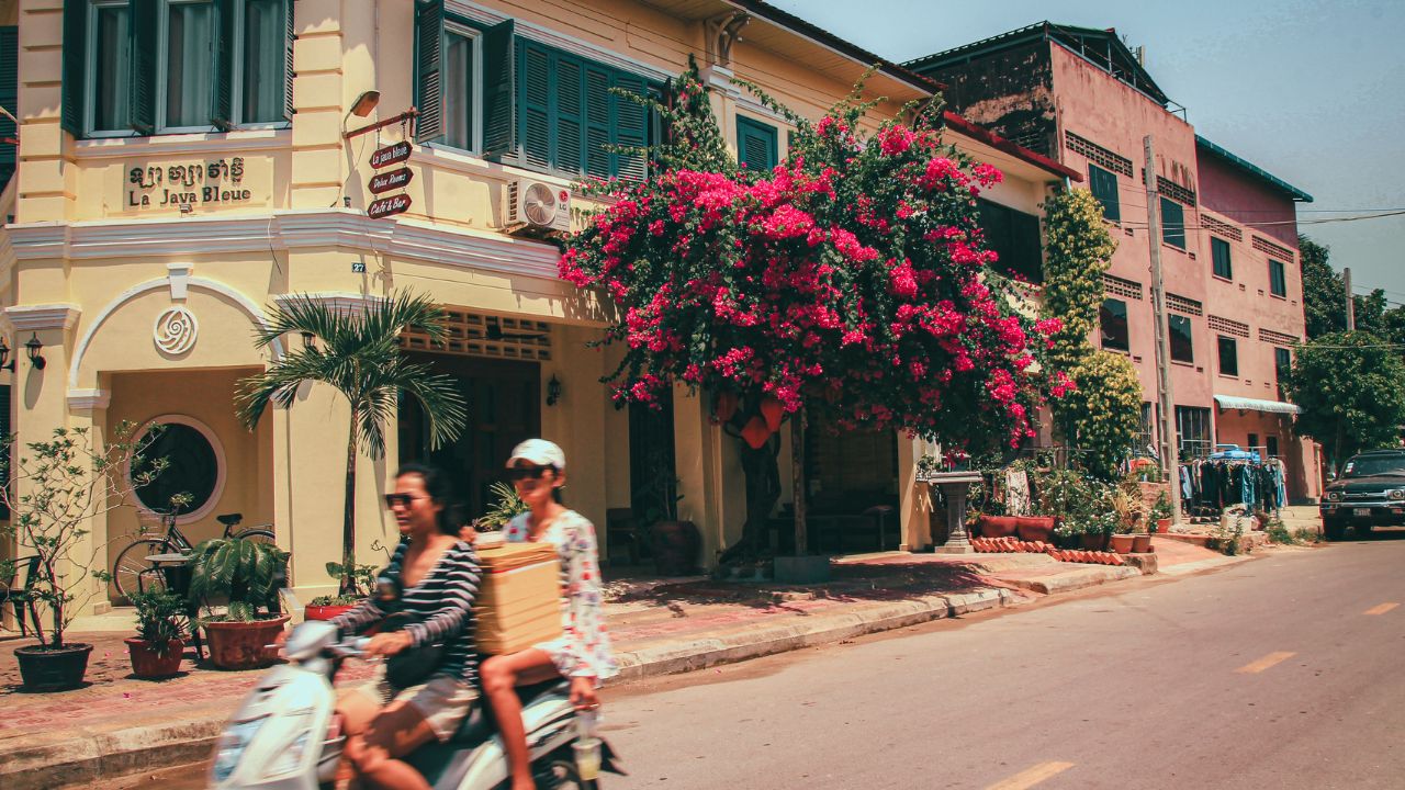 KAMPOT, CAMBODIA - Feb 14, 2020: The old French colonial buildings and houses along the old market streets of Kampot, Cambodia
