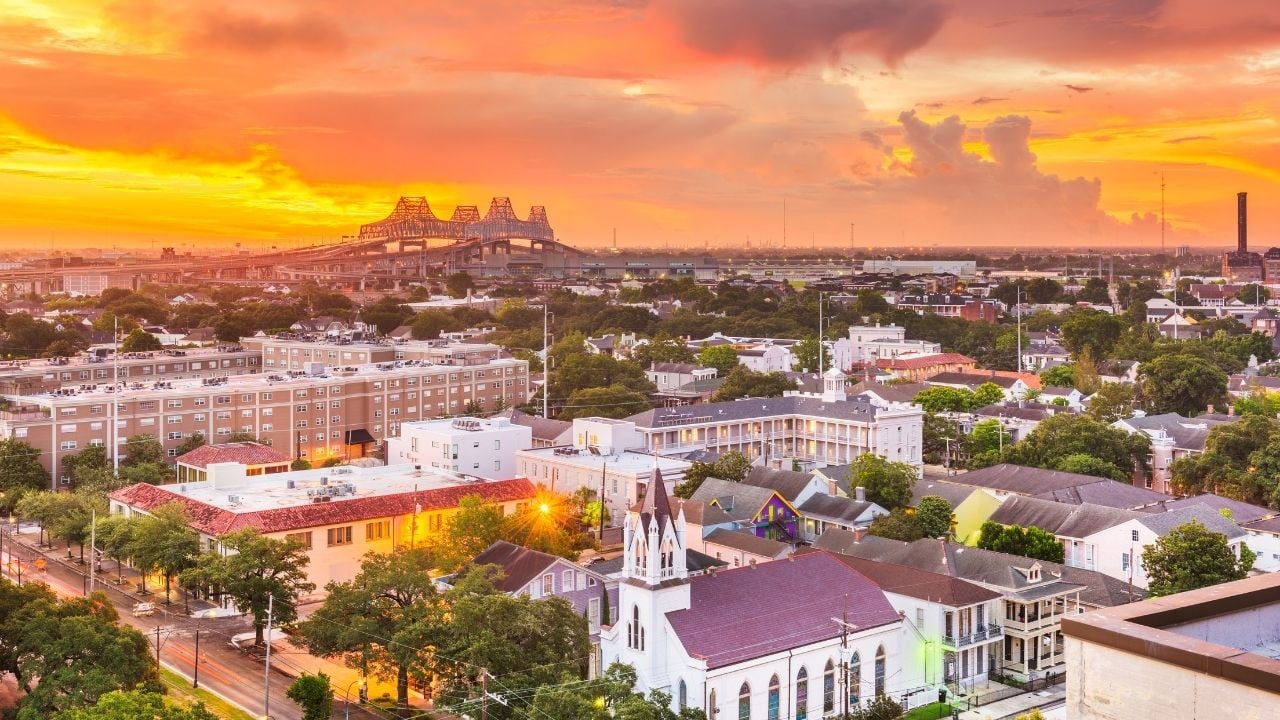 New Orleans, Louisiana, USA town skyline over the Garden District at dawn.