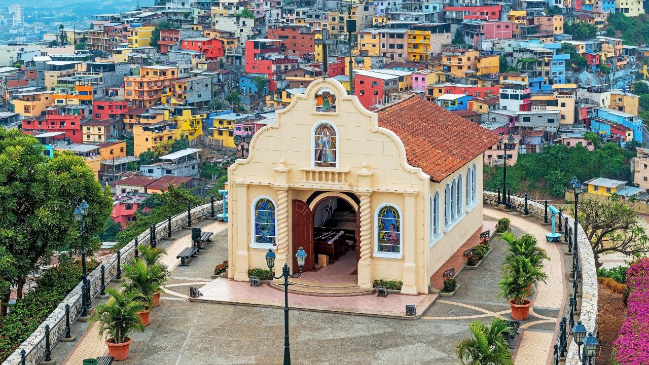 Cityscape of Santa Ana Hill Church with colorful colonial housing, Las Penas district, Guayaquil, Ecuador.