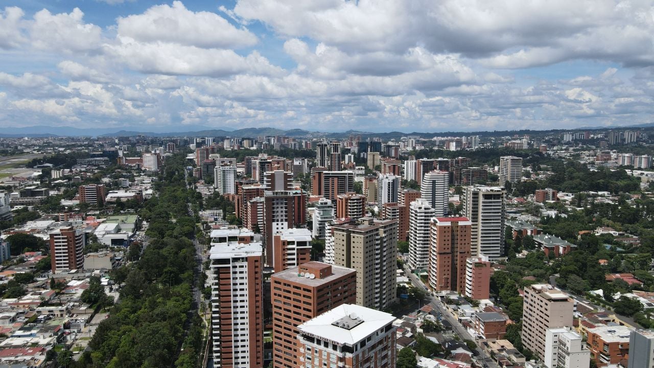 Day and night drone views of Guatemala City.