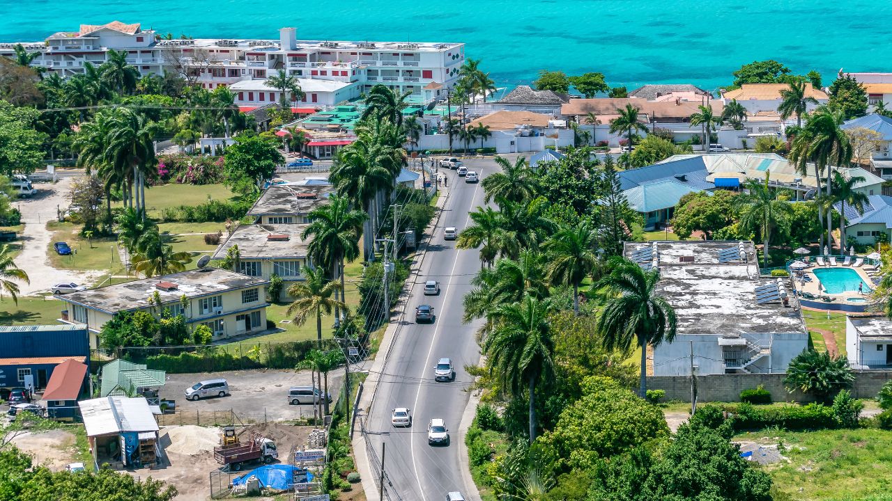 Montego Bay, Jamaica - March 27 2015: Aerial/Drone view near coastline in tourism resort city of Montego Bay, Jamaica. Turquoise ocean water along the coast of tropical Caribbean island.