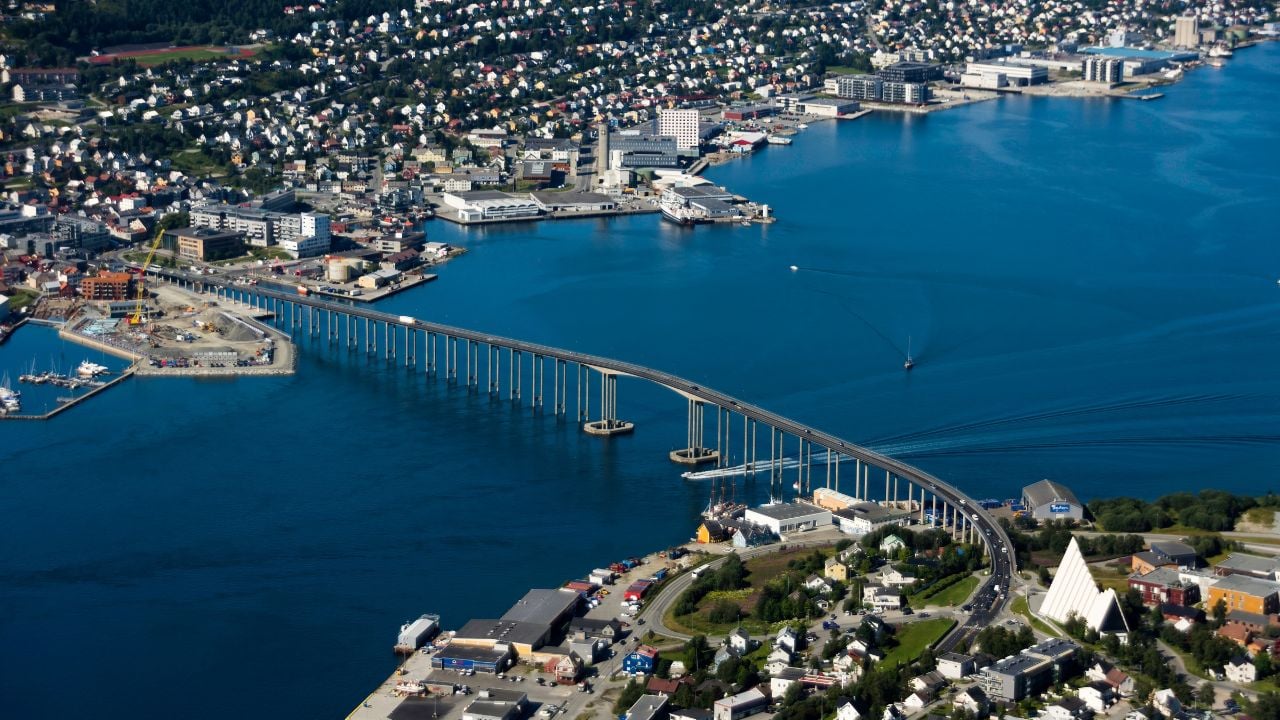 Panoramic View of Tromsø Bridge and Cityscape under Arctic Skies