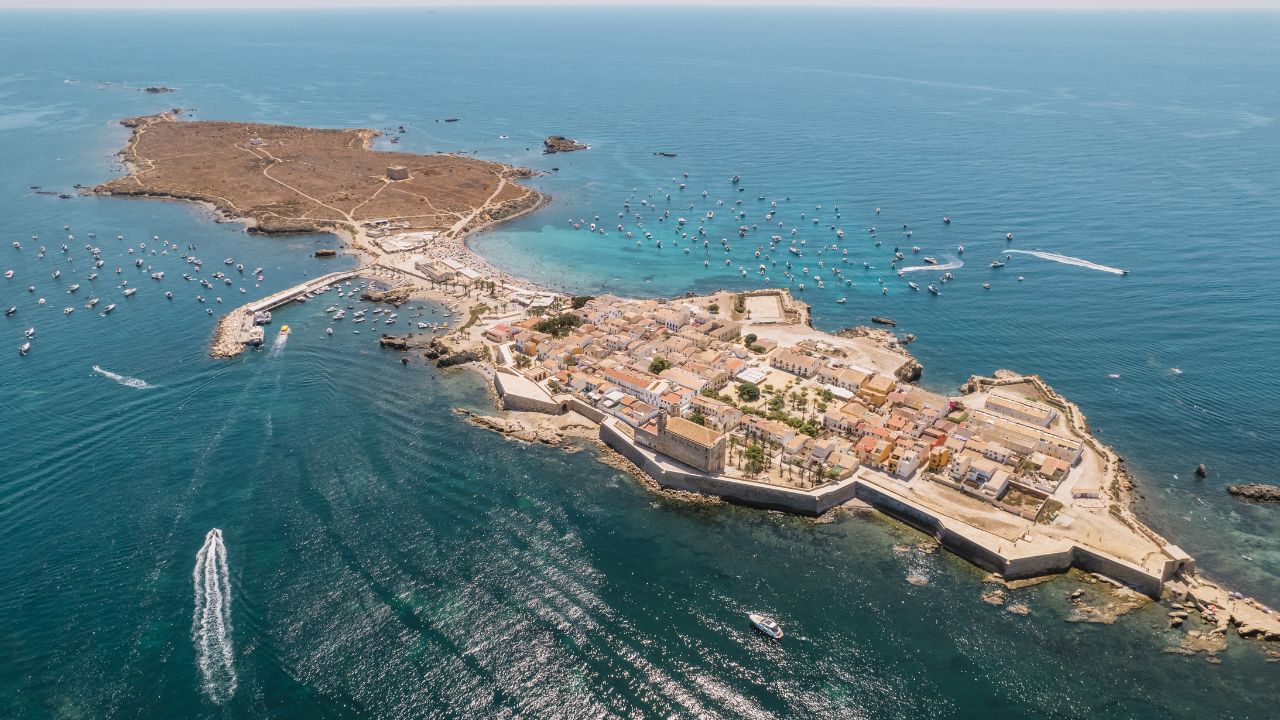 Aerial view of Tabarca island with boats at anchor. Mediterranean Sea. Popular travel destinations at summer. Spain.
