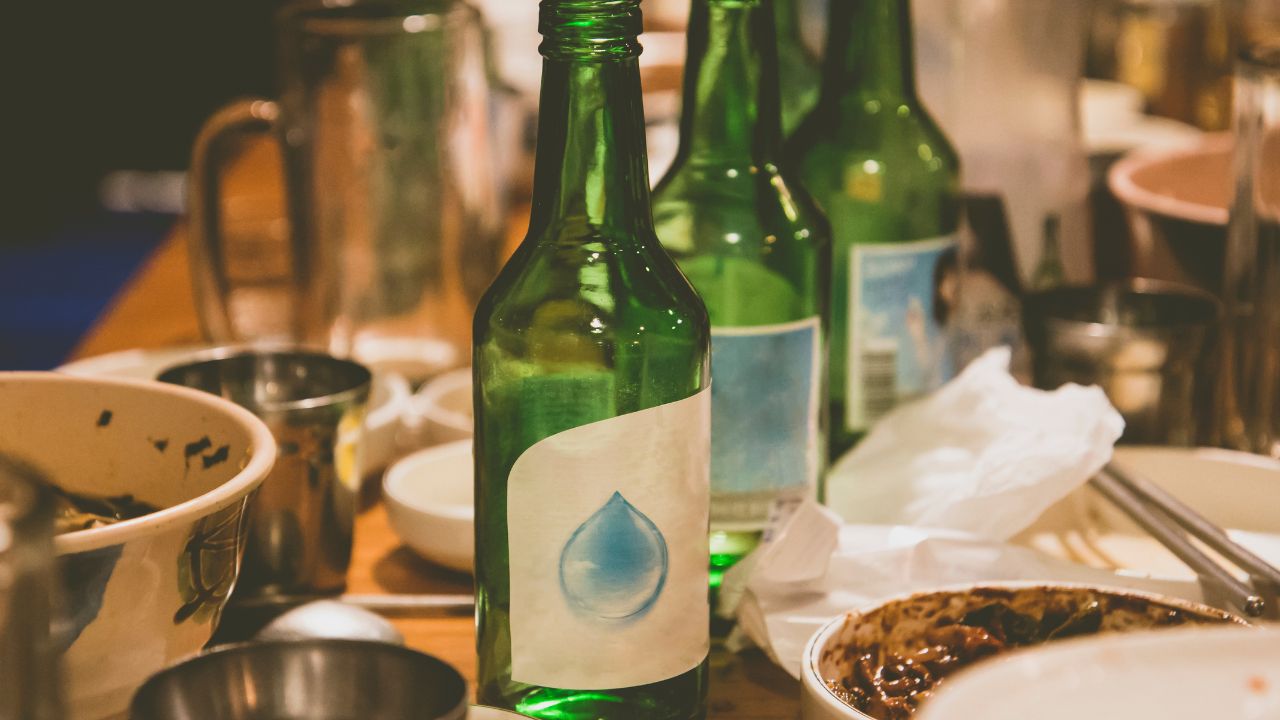 soju bottles and korean side dishes at the party in korea