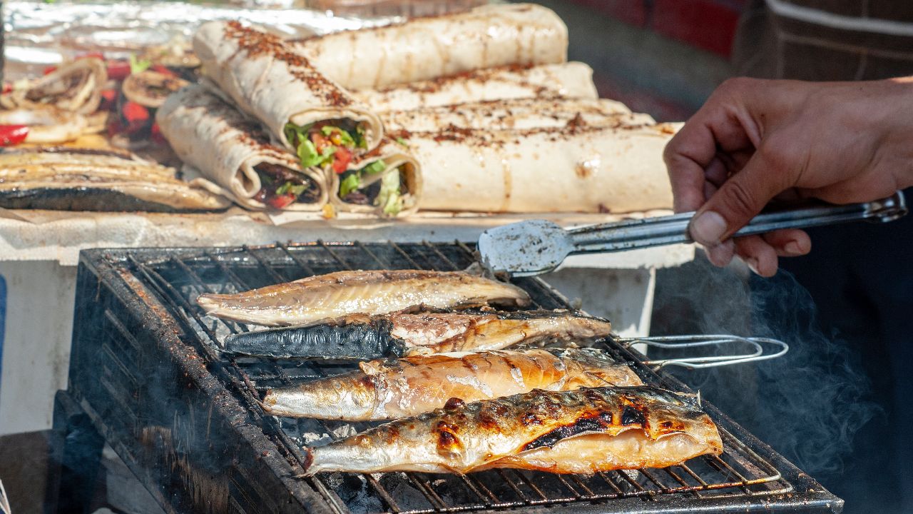 ISTANBUL / TURKEY,9 APRIL, 2018: Balık ekmek - a common product of Turkish cuisine. This is a fried or fried fish sandwich.