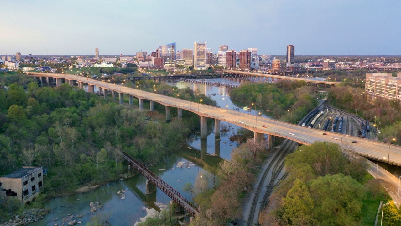 The James River is smooth and slow on this morning in and around Richmond Virginia