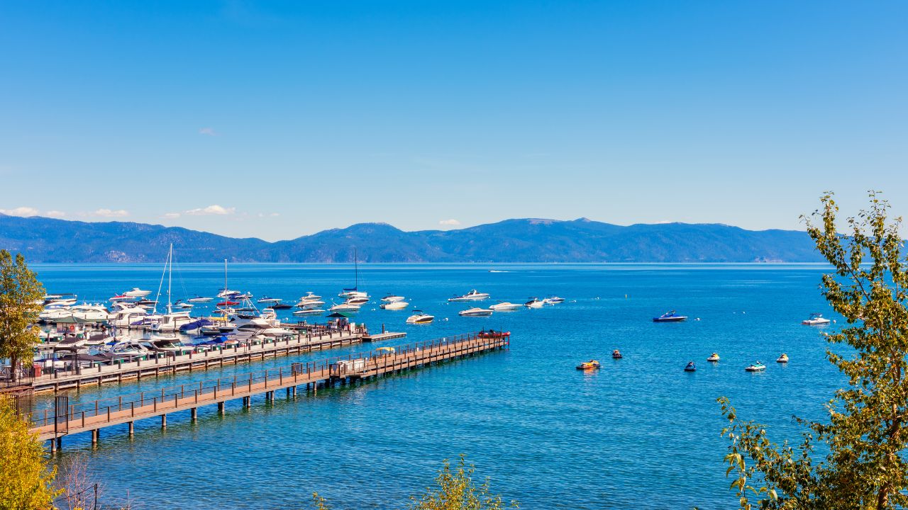 Marina in Tahoe City, California, USA on summer day in september. The state of Nevada is visible across the water.