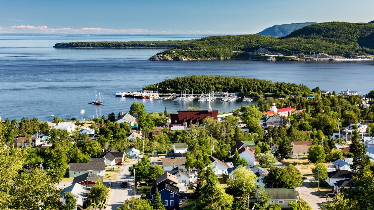 Aerial view of City of Tadoussac, Quebec, Canada. Saguenay river and St-Lawrence river. Beginning of Saguenay Fjord