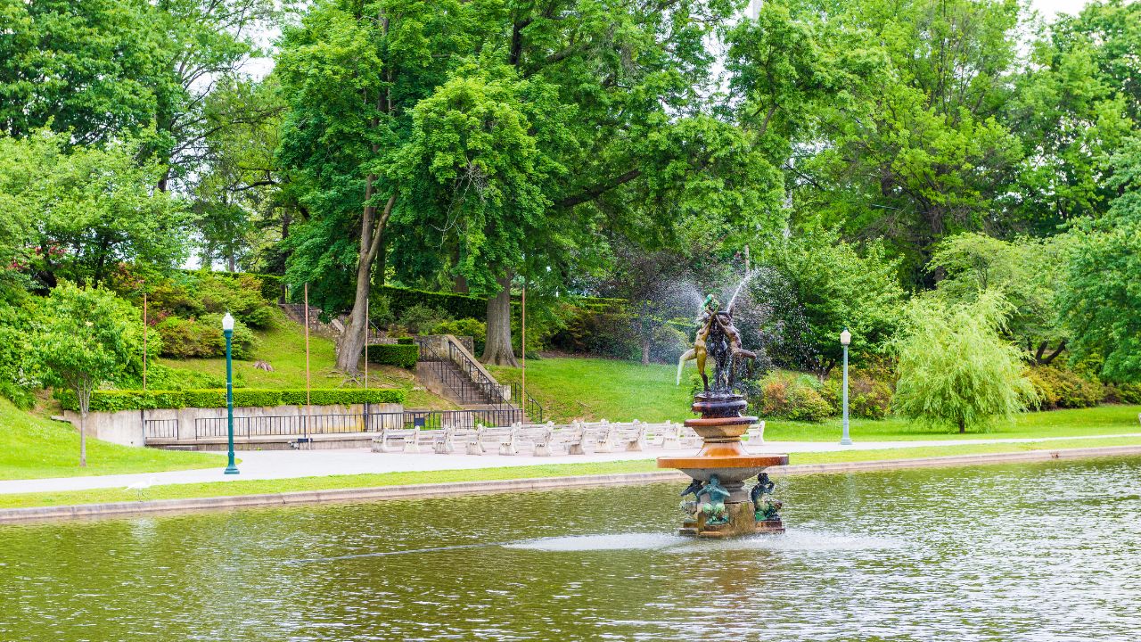 Harrisburg, USA - May 24, 2017: Italian Lake Park in Pennsylvania capital city with fountain and statue