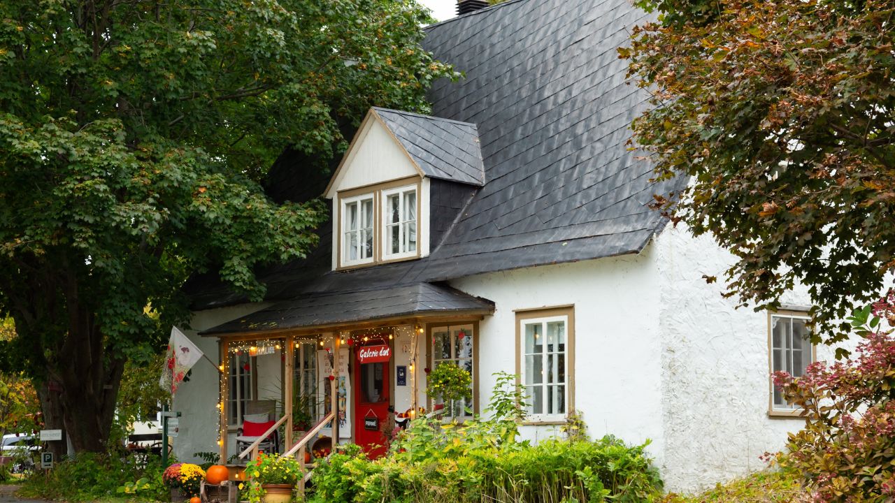 Cap-Santé, Quebec, Canada, October 4, 2023 - The Jeannette Trépanier Art Gallery in patrimonial French style house located at 120 Vieux-Chemin seen during a Fall morning