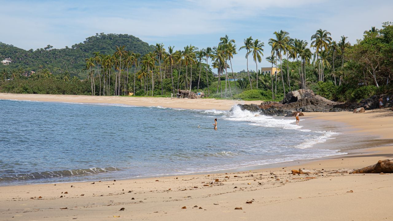 October 16 2022 San Pancho Mexico locals enjoying beautiful beach day in the nice warm water
