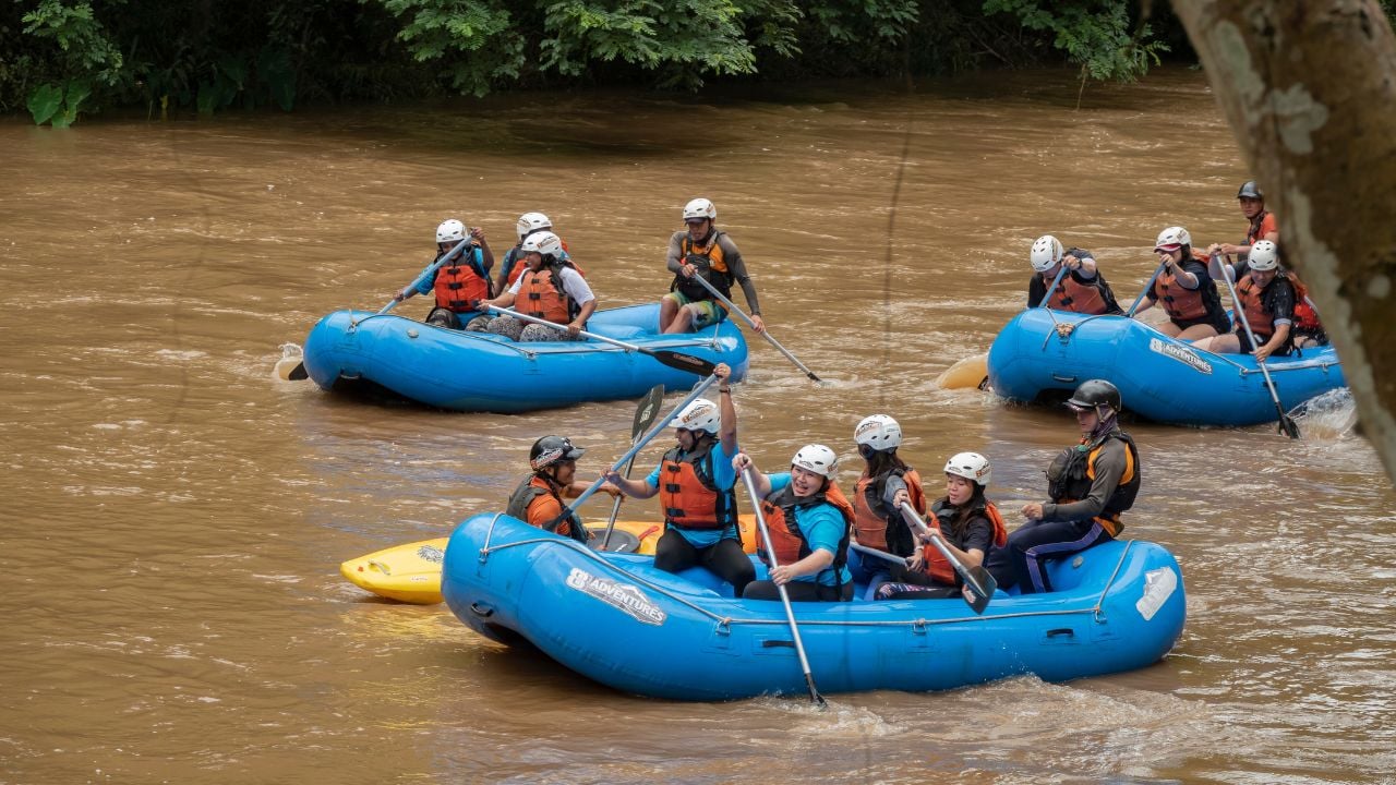Changmai, Thailand - August 18, 2019: Rafting on the Kaeng Khuod river, North Thailand, A group of men and women are rafting on the river, extreme and fun sport.