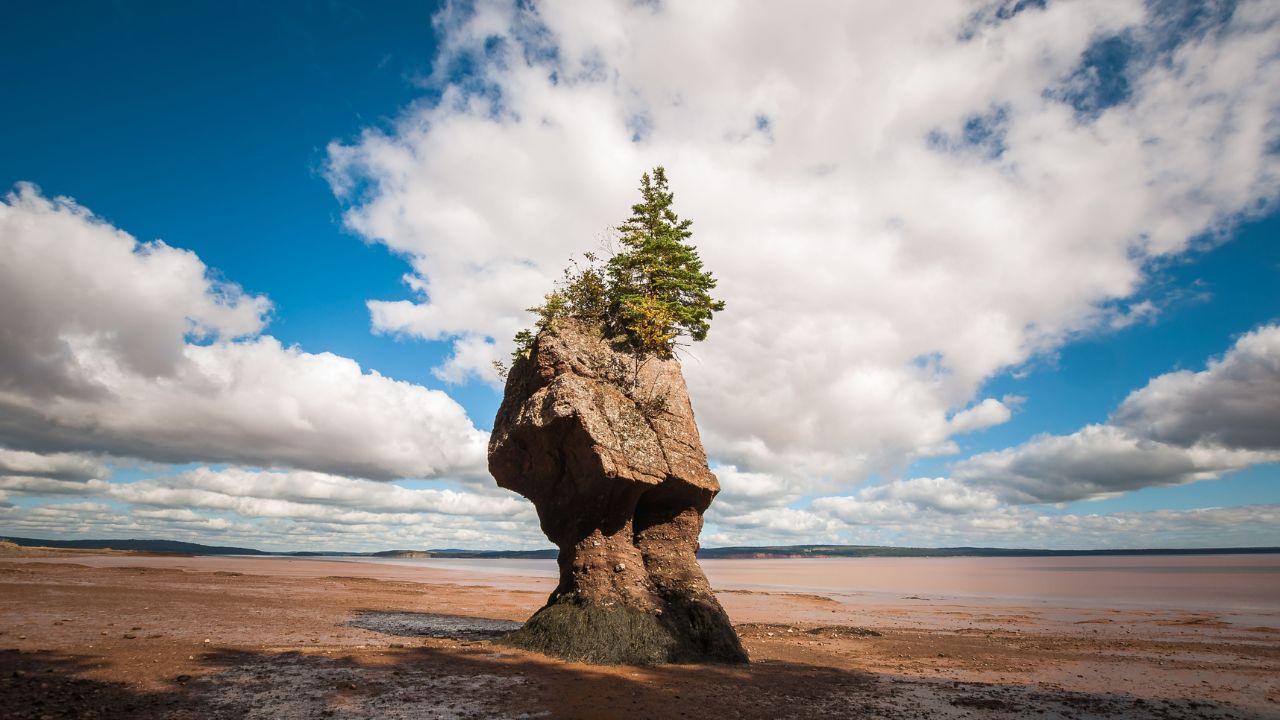 A picturesque scene of Hopewell Rocks Provincial Park in the Bay of Fundy, New Brunswick, Canada