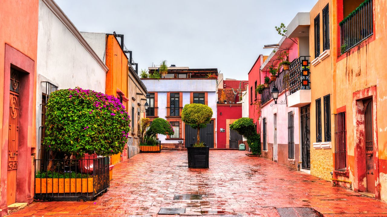 Traditional colorful houses in Santiago de Queretaro, Mexico in rainy weather