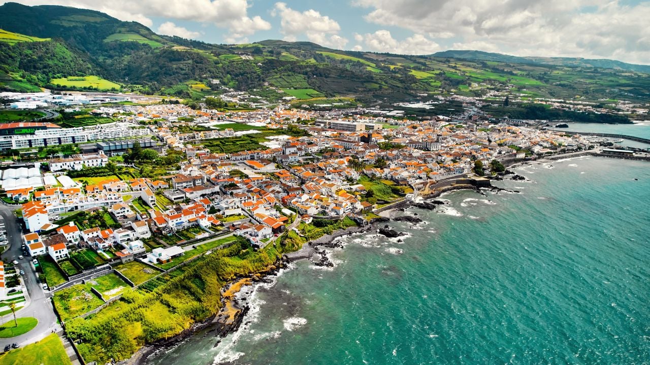 Aerial shot, drone point of view of Ribeira Grande town in the Ponta Delgada island. Sao Miguel, Azores, Portugal. Travel destinations and tourism concept