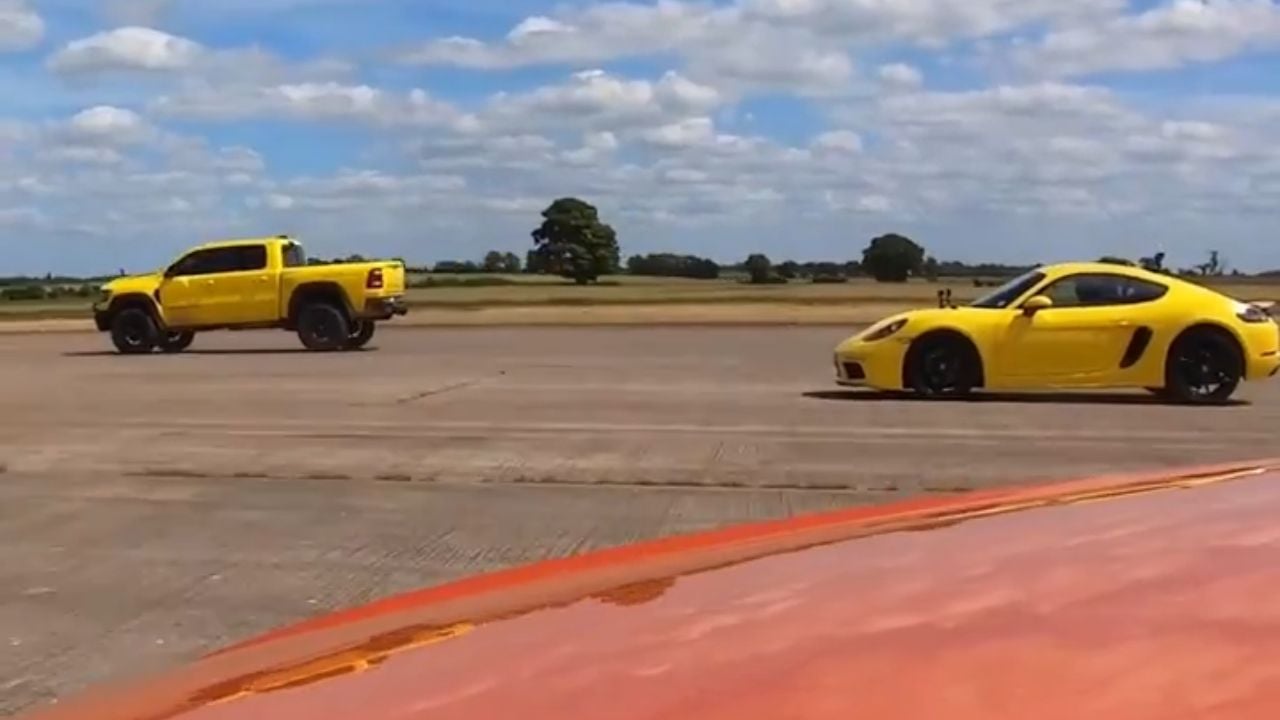 Hennessey Mammoth 1000 TRX racing a Porsche 911 and Nissan sports car.