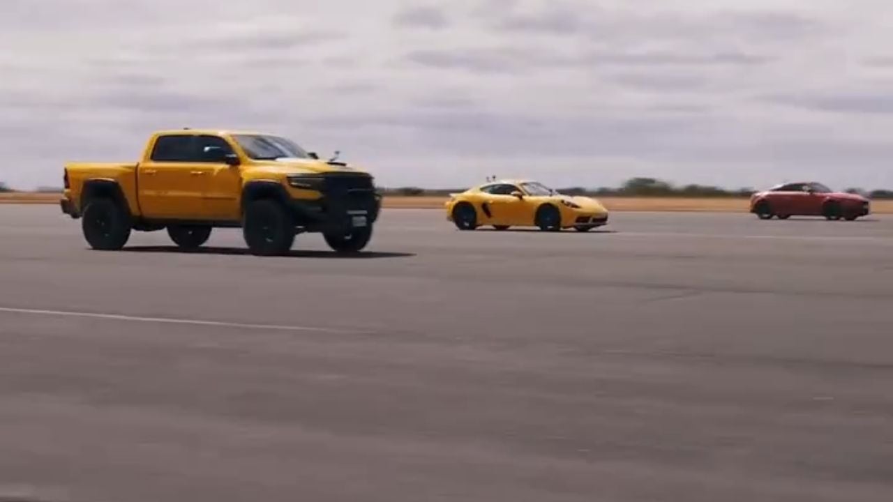 Hennessey Mammoth 1000 TRX racing a Porsche 911 and Nissan sports car.