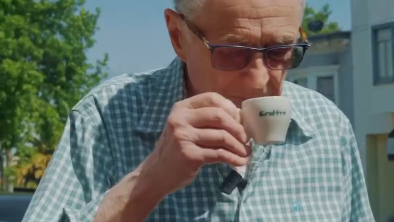 Man drinking coffee.