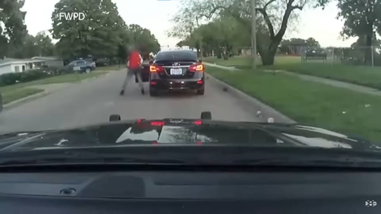 Police officer Burrell saved by bulletproof glass.