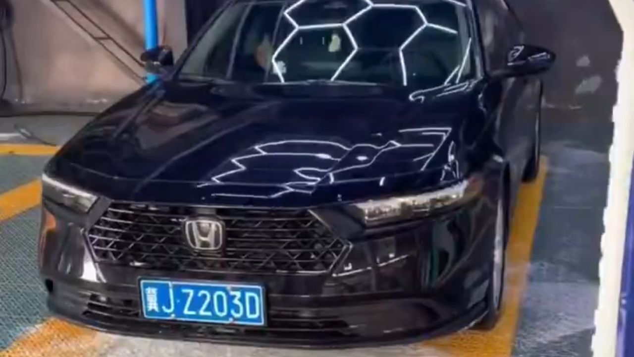 Honda Accord sedan in a carwash.