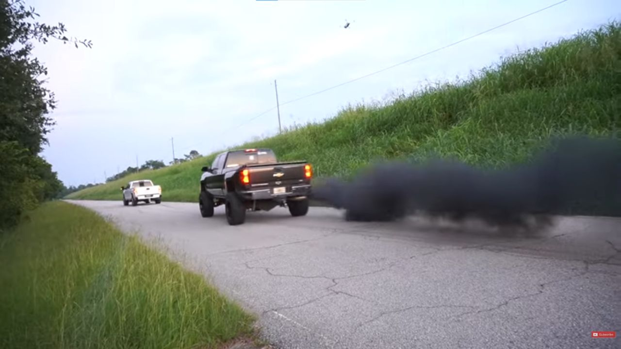 Diesel truck rolling coal.