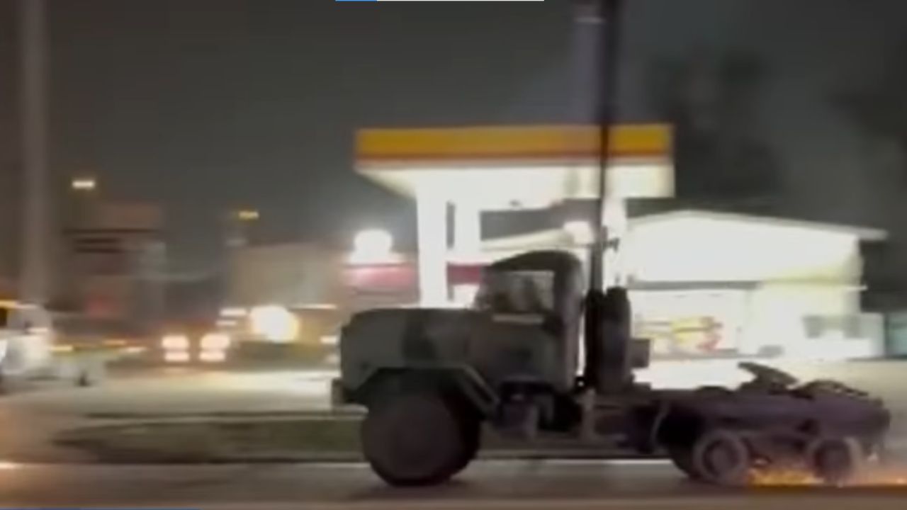 Military truck in police chase.