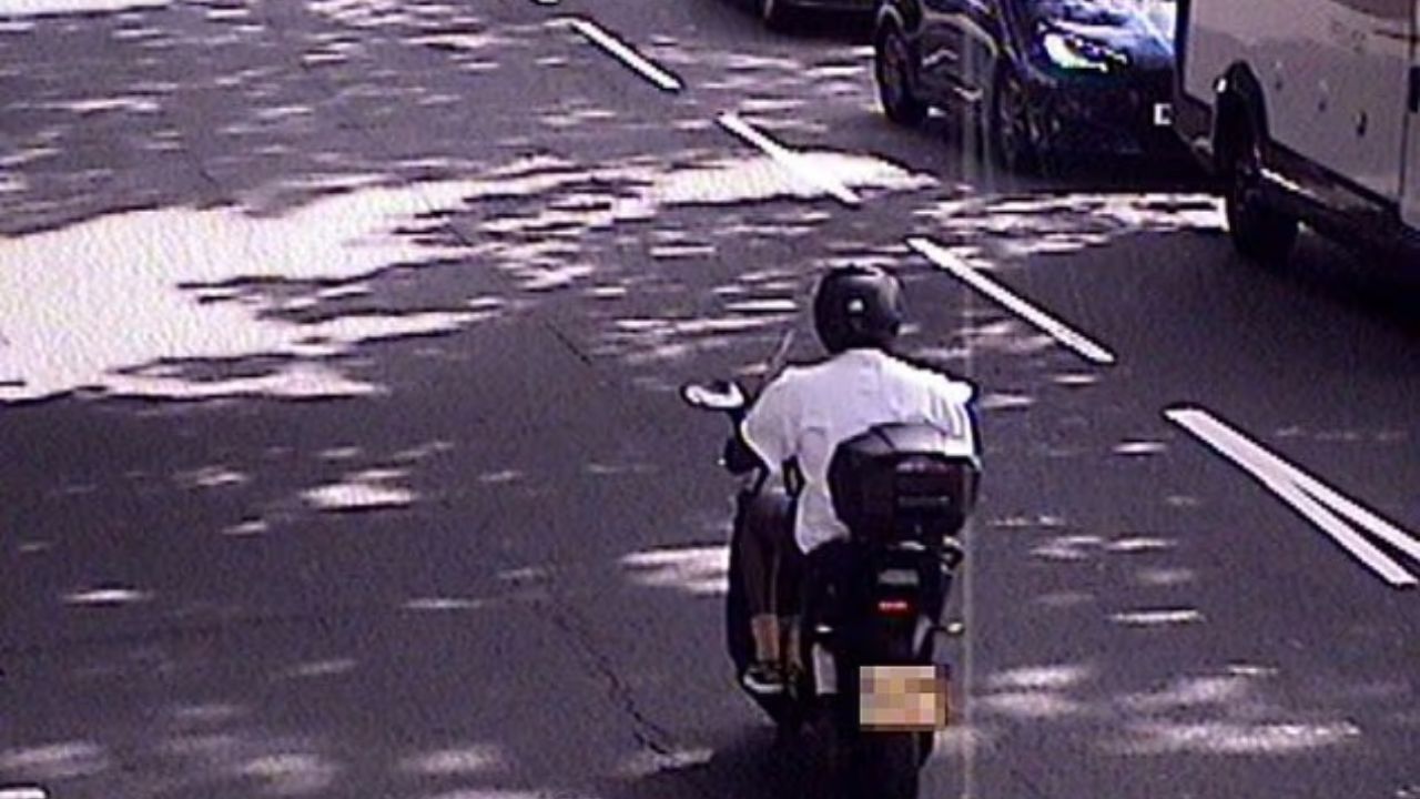 Idris Elba riding his BMW Moped.