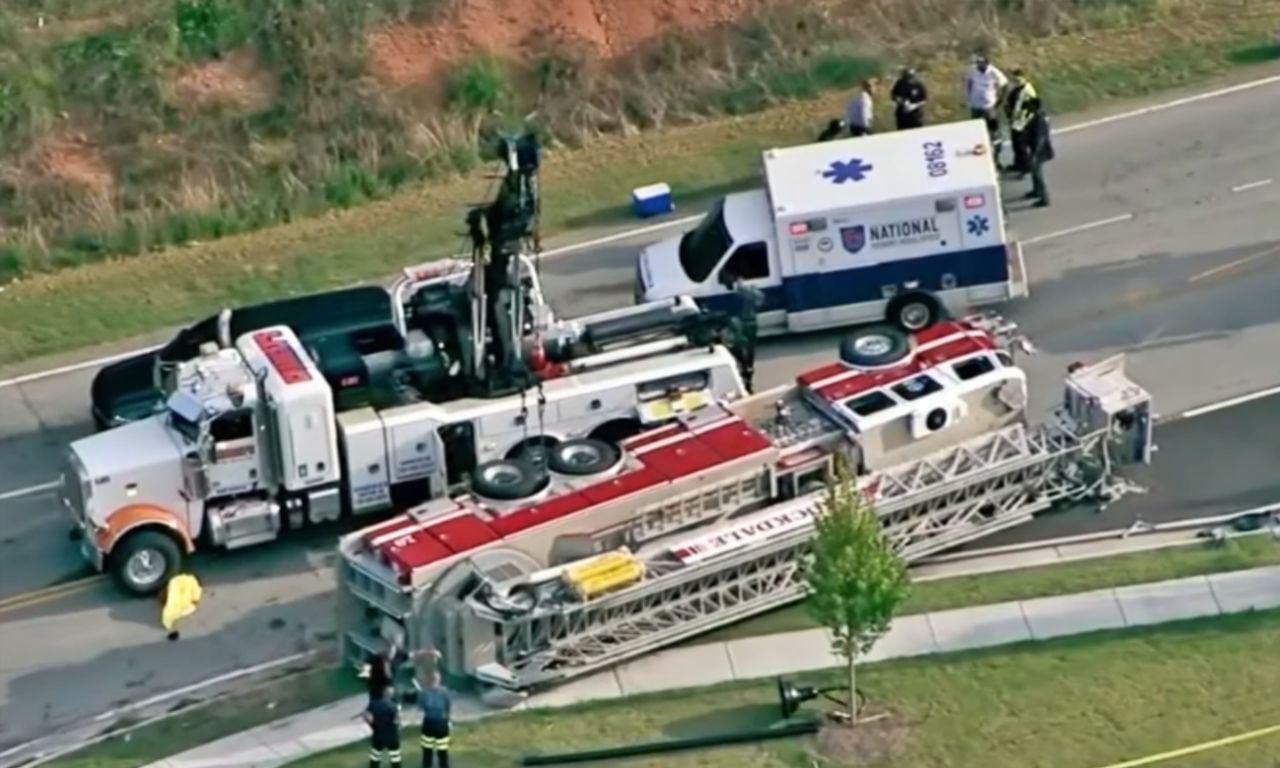 A firefighter died after a Rockdale County Fire Rescue fire truck flipped on the highway.