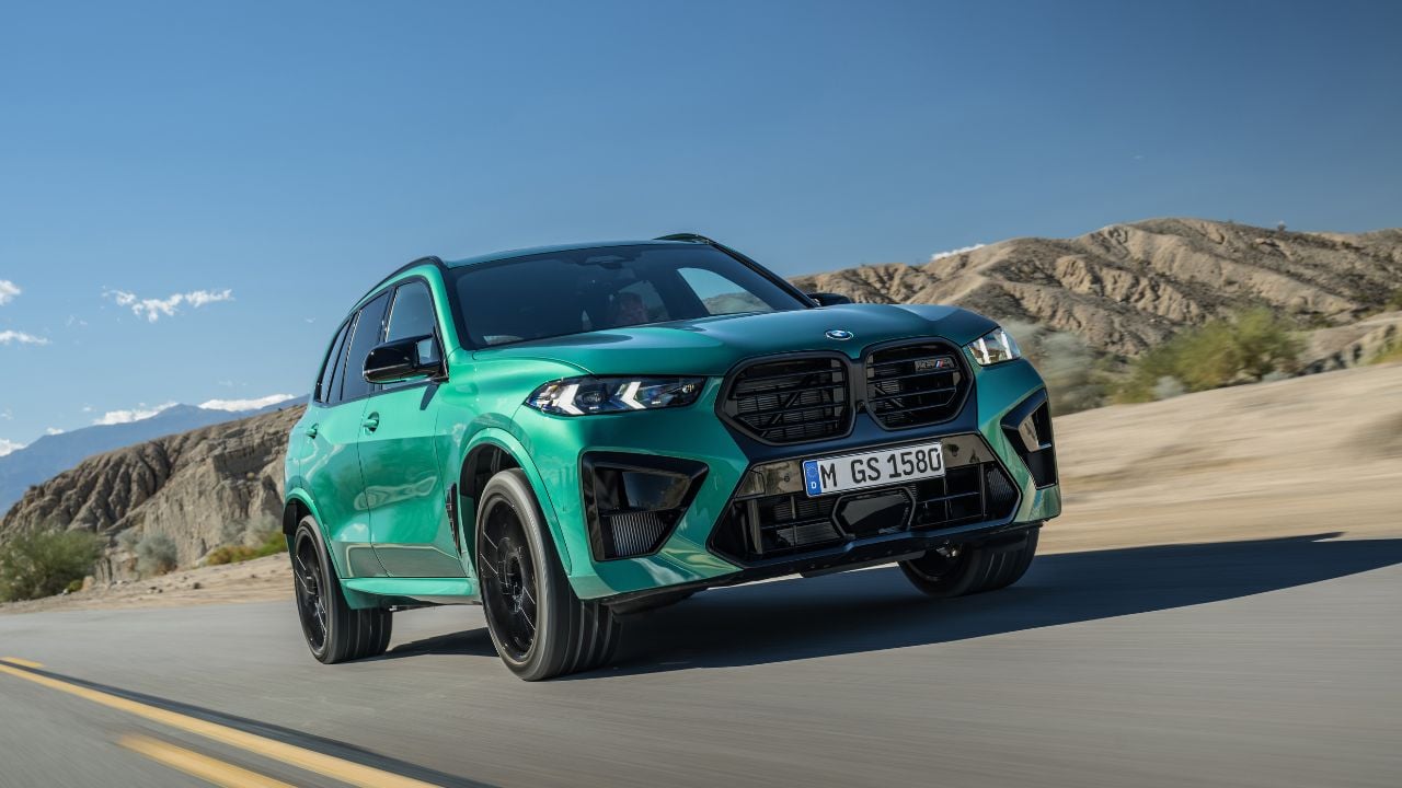 Green 2026 BMW X5 M Competition Front 3/4 driving