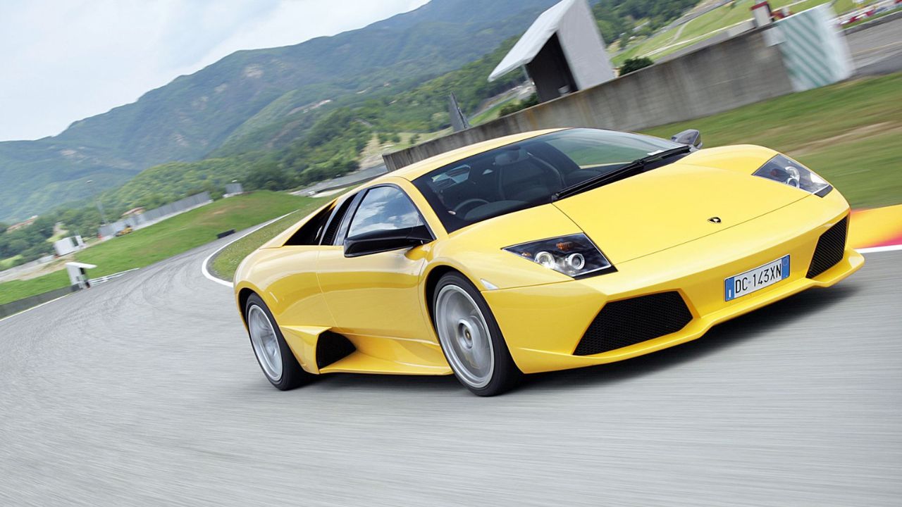 Yellow Lamborghini Murciélago LP 640 Front 3/4 Driving
