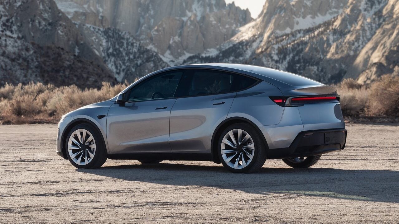 2025 Tesla Model Y side view.