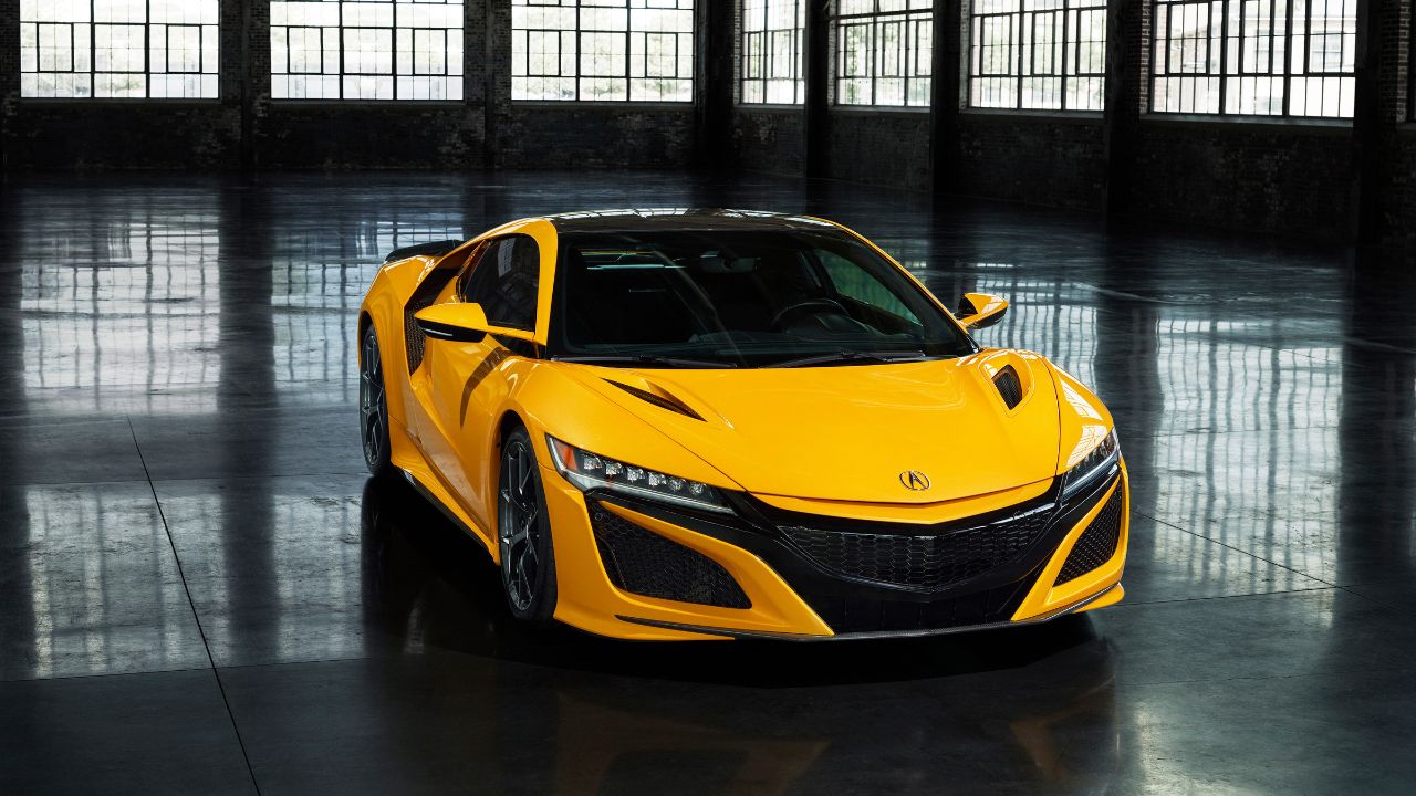 Yellow Second-Generation Acura NSX Front 3/4 view in a warehouse