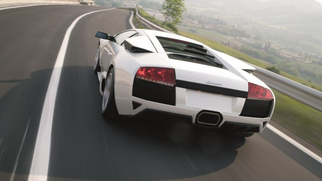 White Lamborghini Murciélago LP 640 Raar 3/4 Driving
