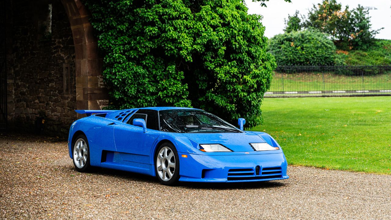 Blue Bugatti EB 110 front 3/4 parked
