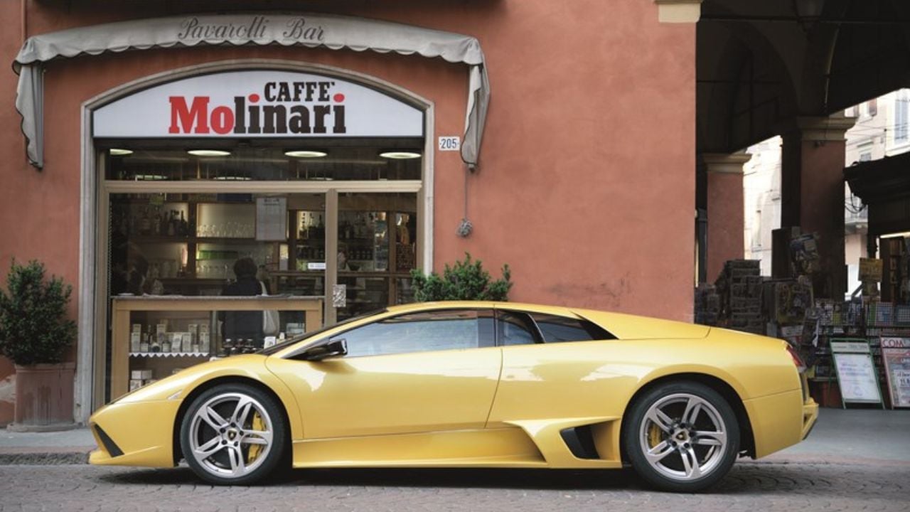 Yellow Lamborghini Murciélago LP 640 Side View parked