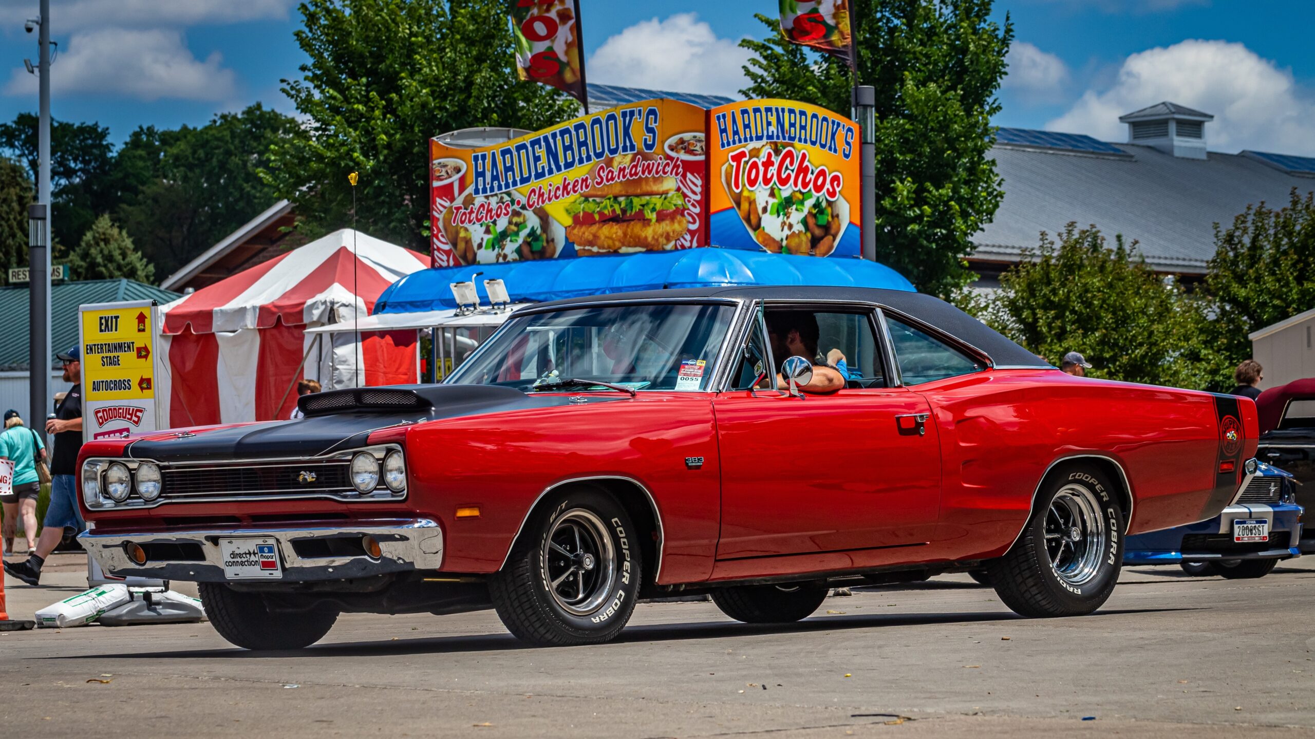 Wide angle front corner view of a 1969 Dodge Super Bee Hardtop Coupe at a local car show