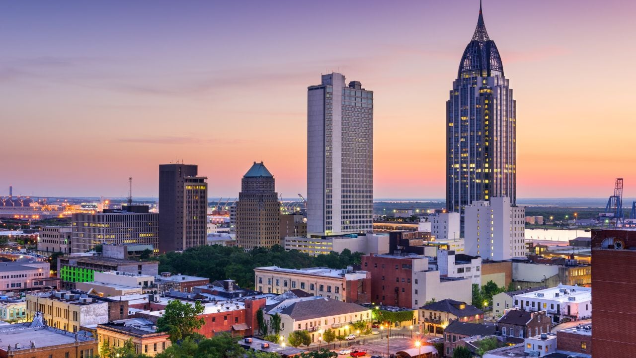 Mobile, Alabama, USA downtown skyline at dusk.