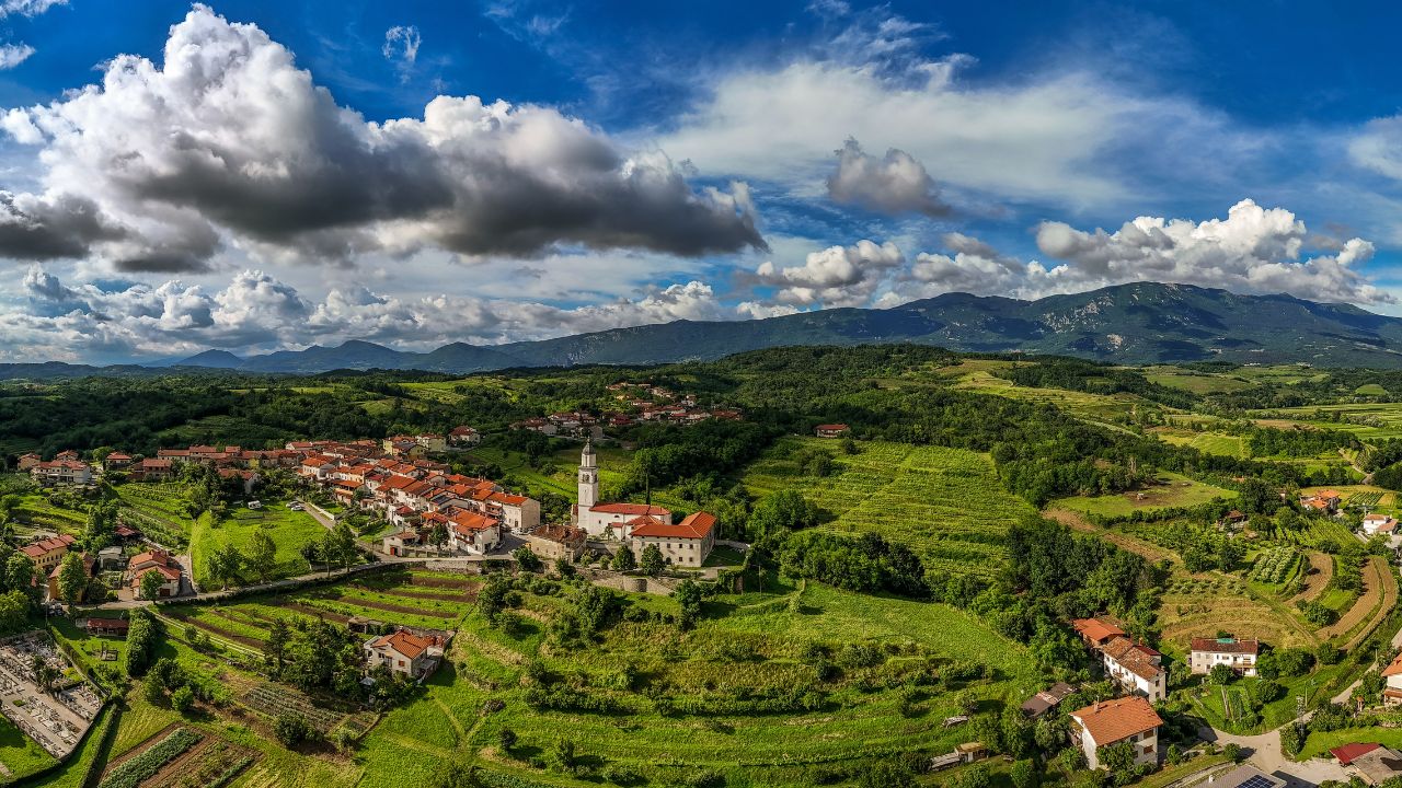 Picturesque Vipava Valley Town with Rolling Hills and Vineyards