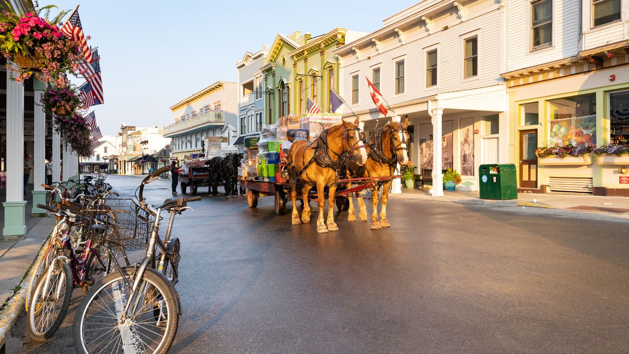 Mackinac Island Michigan, USA - July 6, 2021: The quiet street of downtown Mackinac Island Michigan in the early morning after rain
