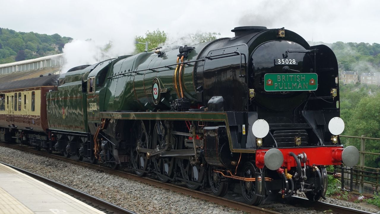 The British Pullman steam train engine pulls away from Bath Spa railway station on May 16, 2018 in London, UK.