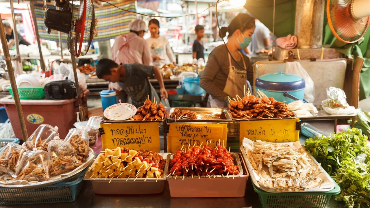 BANGKOK, THAILAND, NOV 4, 2017: Many delicious prepared Thai foods are sold at the daily Or Tor Kor Fresh Food Market / Street Food
