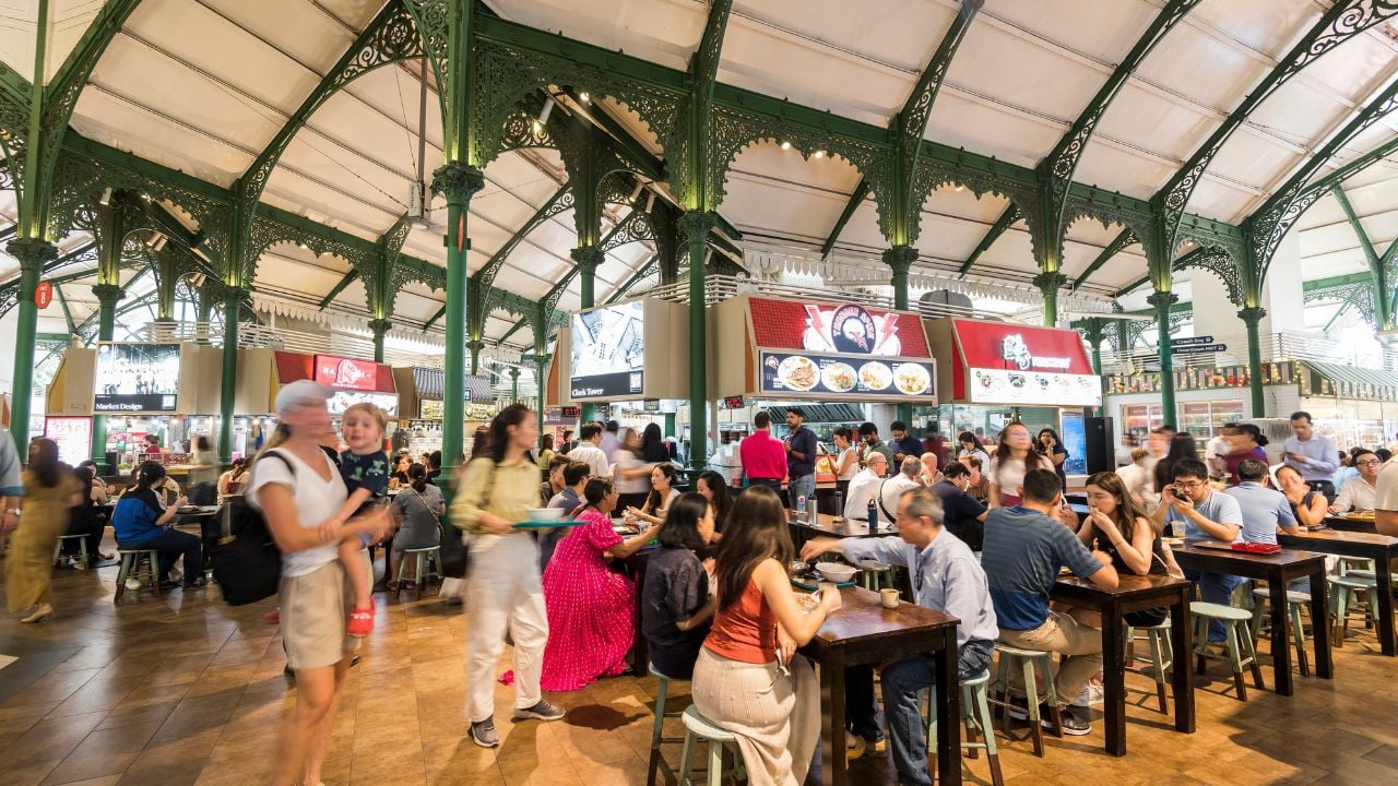 Singapore- July 17, 2024: View of people dining in the Lau Pa Sat hawker market in Singapore, it was one of the oldest Victorian structures in Southeast Asia.