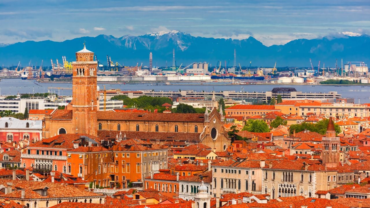 View from Campanile di San Marco to Church of San Stefano, Venice Mestre, the seaport and the mountain at summer morningin Venice, Italy