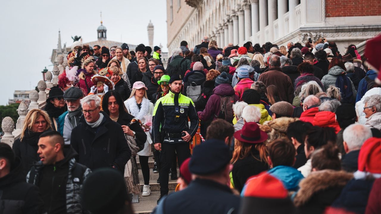 Venice, Italy - March 01, 2025: Crowds celebrate Venice Carnival with vibrant costumes and energy
