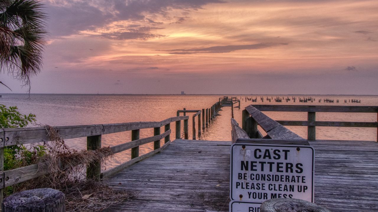 Rotary Riverside Park in Titusville FL Cloudy morning along the Indian River An example of what the boardwalk looked like after Hurricane Irma