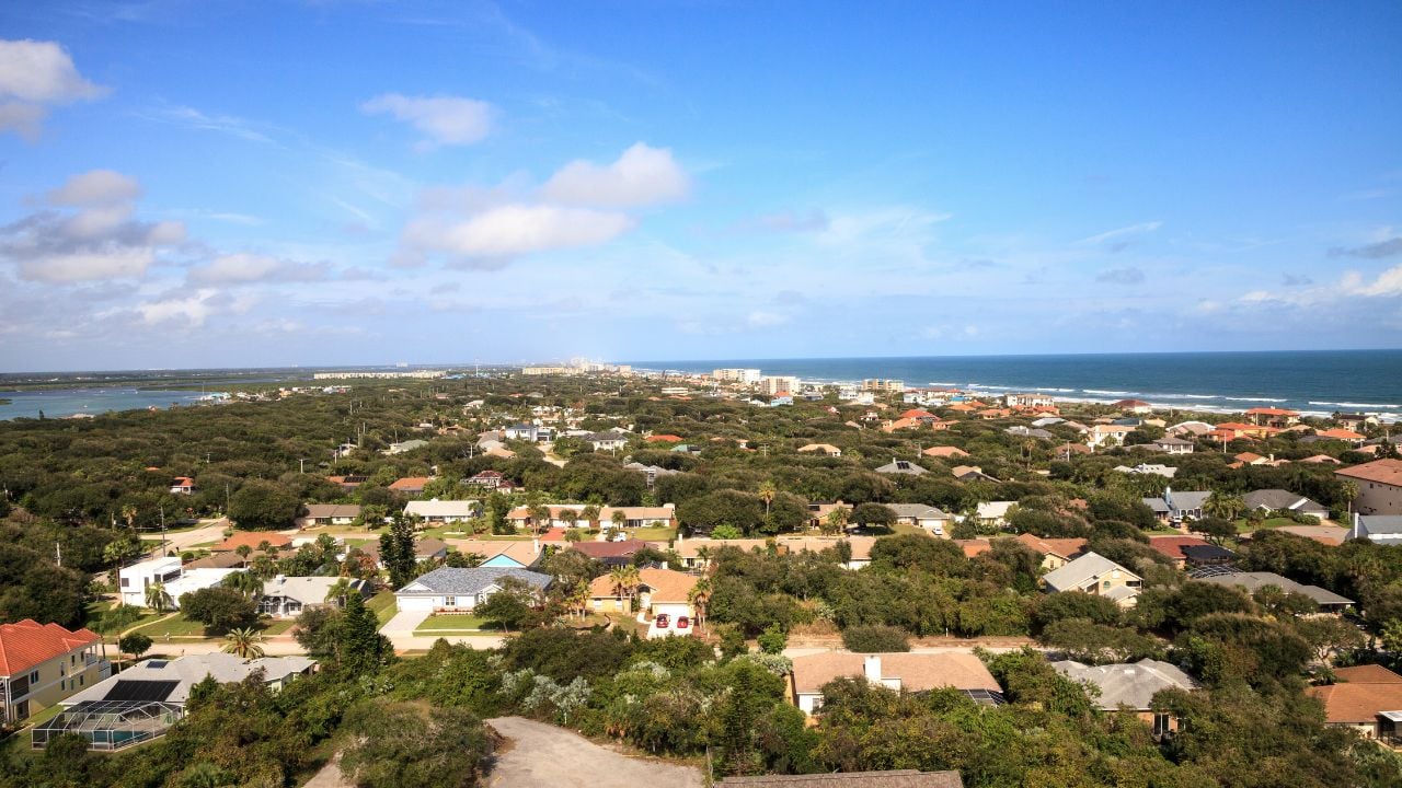 Aerial view of the coastline of New Smyrna Beach and Ponce de Leon Inlet in Central Florida.