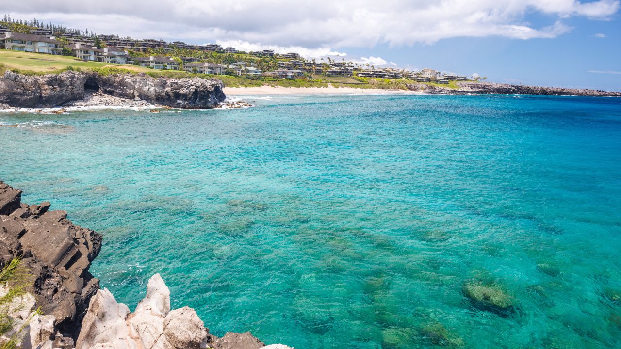 Beautiful Maui landscape in Hawaii featuring turquoise sea and rocky shore